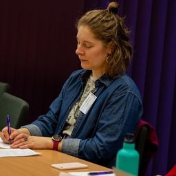 Aleksandra at a conference